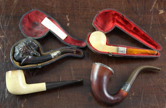 Four Meerschaum and wood pipes,
